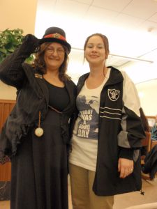 At our annual Library Staff Association Holiday Party, the costume contest was "Decades."  Here, colleague Julie Ree and I show off our 90's looks - 1890s and 1990s that is!